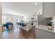 Modern kitchen with granite countertops, stainless steel appliances, and an island with bar seating at 529 Azalea Bloom Dr, Loganville, GA 30052