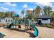 Community playground with slides and climbing structures for children at 529 Azalea Bloom Dr, Loganville, GA 30052