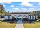 Community pool featuring ample seating, covered lounge areas, and well-maintained grounds at 529 Azalea Bloom Dr, Loganville, GA 30052
