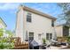Exterior showcasing a patio, backyard and tidy landscaping at 6454 Grey Fox Way, Riverdale, GA 30296