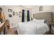 Relaxing bedroom with a plush, tufted headboard and tasteful decor at 6454 Grey Fox Way, Riverdale, GA 30296