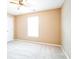 Inviting bedroom with soft neutral walls, cozy carpet, and natural light from the window at 1008 Walnut Creek Dr, Woodstock, GA 30188