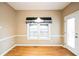 Cozy breakfast area with natural light from windows, perfect for relaxed mornings at 1008 Walnut Creek Dr, Woodstock, GA 30188