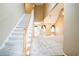 Spacious living room features a staircase, soaring ceilings, plush carpet, and open layout at 1008 Walnut Creek Dr, Woodstock, GA 30188