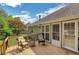 Charming back deck with cozy seating, perfect for enjoying the outdoors and overlooking the lush backyard at 1050 Chestnut Hill Sw Cir, Marietta, GA 30064
