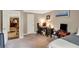 Spacious bedroom with neutral carpet, walls, and a large window at 1050 Chestnut Hill Sw Cir, Marietta, GA 30064