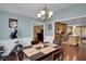 View of the dining room leading to the kitchen, showcasing the home's open-concept design and flow at 1050 Chestnut Hill Sw Cir, Marietta, GA 30064
