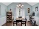 Dining room with a large window and exercise equipment at 1050 Chestnut Hill Sw Cir, Marietta, GA 30064