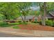 Well-maintained brick building with manicured lawn, enhancing curb appeal at 1050 Chestnut Hill Sw Cir, Marietta, GA 30064