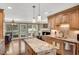 Well-appointed kitchen with stainless appliances, granite countertops, and a view to living area at 1050 Chestnut Hill Sw Cir, Marietta, GA 30064
