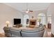 Inviting living room featuring a brick fireplace, hardwood floors, and comfortable seating at 1050 Chestnut Hill Sw Cir, Marietta, GA 30064