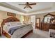 Spacious main bedroom features trey ceiling, carpet and en-suite bathroom at 1050 Chestnut Hill Sw Cir, Marietta, GA 30064