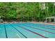 Community pool with lane markers, surrounded by lounge chairs at 1050 Chestnut Hill Sw Cir, Marietta, GA 30064