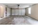 Spacious garage with an overhead door and access to the house at 2950 Camary Place Se Dr, Conyers, GA 30094