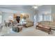 Open-concept living space with a view of the dining area and kitchen featuring updated cabinets and modern appliances at 3238 Sharp Creek Ln, Buford, GA 30519