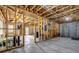 Unfinished basement with exposed framing, offering potential for customization at 416 Wilfawn Way, Avondale Estates, GA 30002