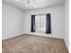 This bedroom is brightly lit, and has clean carpeting and blinds to allow sunlight in at 416 Wilfawn Way, Avondale Estates, GA 30002