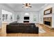 Spacious living room with hardwood floors, fireplace, and crown molding, perfect for entertaining at 416 Wilfawn Way, Avondale Estates, GA 30002