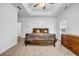 A clean main bedroom is spacious and brightly lit, with carpeted floors, and lots of space at 416 Wilfawn Way, Avondale Estates, GA 30002