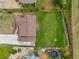 Aerial view of home with lush green lawn at 893 Sandune Dr, Norcross, GA 30093