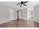 Large bedroom with ceiling fan, and access to an en suite bathroom at 893 Sandune Dr, Norcross, GA 30093