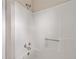 Clean shower/tub with white shower surround and chrome shower head at 893 Sandune Dr, Norcross, GA 30093