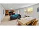 Spacious finished basement area featuring a cozy seating area and a bright workspace with natural light at 1025 Taylor Oaks Dr, Roswell, GA 30076
