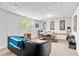 Finished basement with large desk area and comfortable seating at 1025 Taylor Oaks Dr, Roswell, GA 30076