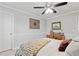 Bedroom with a ceiling fan and natural light at 1025 Taylor Oaks Dr, Roswell, GA 30076