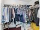 Walk-in closet with metal shelving and clothing storage at 1025 Taylor Oaks Dr, Roswell, GA 30076