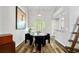 Dining area featuring a round table with four chairs and view of the backyard at 1025 Taylor Oaks Dr, Roswell, GA 30076