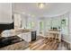 Bright kitchen with breakfast nook, stainless steel dishwasher and granite countertops at 1025 Taylor Oaks Dr, Roswell, GA 30076