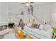 Bright living room with high ceilings, a fireplace, and a staircase to the upper level at 1025 Taylor Oaks Dr, Roswell, GA 30076