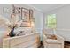 Bright bedroom with light-colored furniture, decor, and natural light at 1025 Taylor Oaks Dr, Roswell, GA 30076