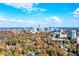 Scenic view of the city skyline beyond mature trees in foreground, offering urban proximity with a nature feel at 15 Cherokee Nw Rd, Atlanta, GA 30305