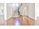 Elegant foyer with a curved staircase, hardwood floors, and plenty of natural light at 15 Cherokee Nw Rd, Atlanta, GA 30305