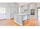 Well-appointed kitchen with custom cabinets, stainless steel appliances, and hardwood floors at 15 Cherokee Nw Rd, Atlanta, GA 30305