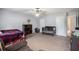 Large bedroom with neutral walls, a ceiling fan, and sufficient space for a crib and bedroom set at 2730 Milton Bryan Dr, Loganville, GA 30052