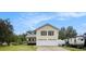 Charming two-story home featuring a two-car garage and a lovely front porch in a suburban setting at 2730 Milton Bryan Dr, Loganville, GA 30052