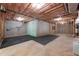 Spacious unfinished basement featuring concrete floors and walls, ready for customization with insulated ceilings and exposed framing at 310 Anders Path, Marietta, GA 30064