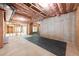 Unfinished basement with exposed ceiling insulation awaiting your unique personalization and design at 310 Anders Path, Marietta, GA 30064