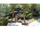 Beautifully landscaped front yard with lush greenery and stone steps leading to the inviting home entrance at 310 Anders Path, Marietta, GA 30064