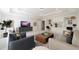 Spacious living room with a comfortable seating arrangement, mounted TV, and stylish decor at 310 Anders Path, Marietta, GA 30064