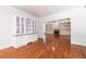 Living room featuring built-in cabinets, hardwood floors, and fireplace at 310 Anders Path, Marietta, GA 30064