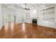 Large living room features built-in shelving, fireplace, and access to outdoor space at 310 Anders Path, Marietta, GA 30064