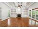 Open living room featuring fireplace and built-in shelving at 310 Anders Path, Marietta, GA 30064