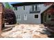 Spacious flagstone patio with stairs and lush landscaping that enhances the property's outdoor living space at 310 Anders Path, Marietta, GA 30064