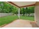 Covered patio offering a shaded outdoor space, perfect for relaxation and entertaining in a private backyard at 672 Bostonian Way, Lawrenceville, GA 30046