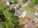 Birds eye view featuring a backyard patio area and landscaped yard surrounded by mature trees at 1126 Gate Post Ct, Powder Springs, GA 30127
