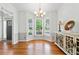 The dining room boasts hardwood floors, a bay window and lots of light for enjoyment at 1126 Gate Post Ct, Powder Springs, GA 30127